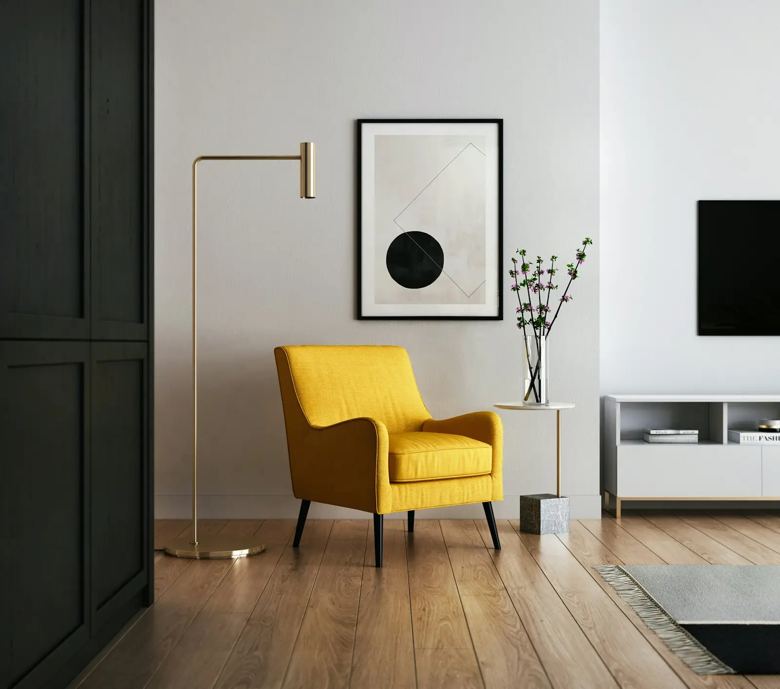 A yellow armchair in a quiet corner with a floor lamp and wood floors